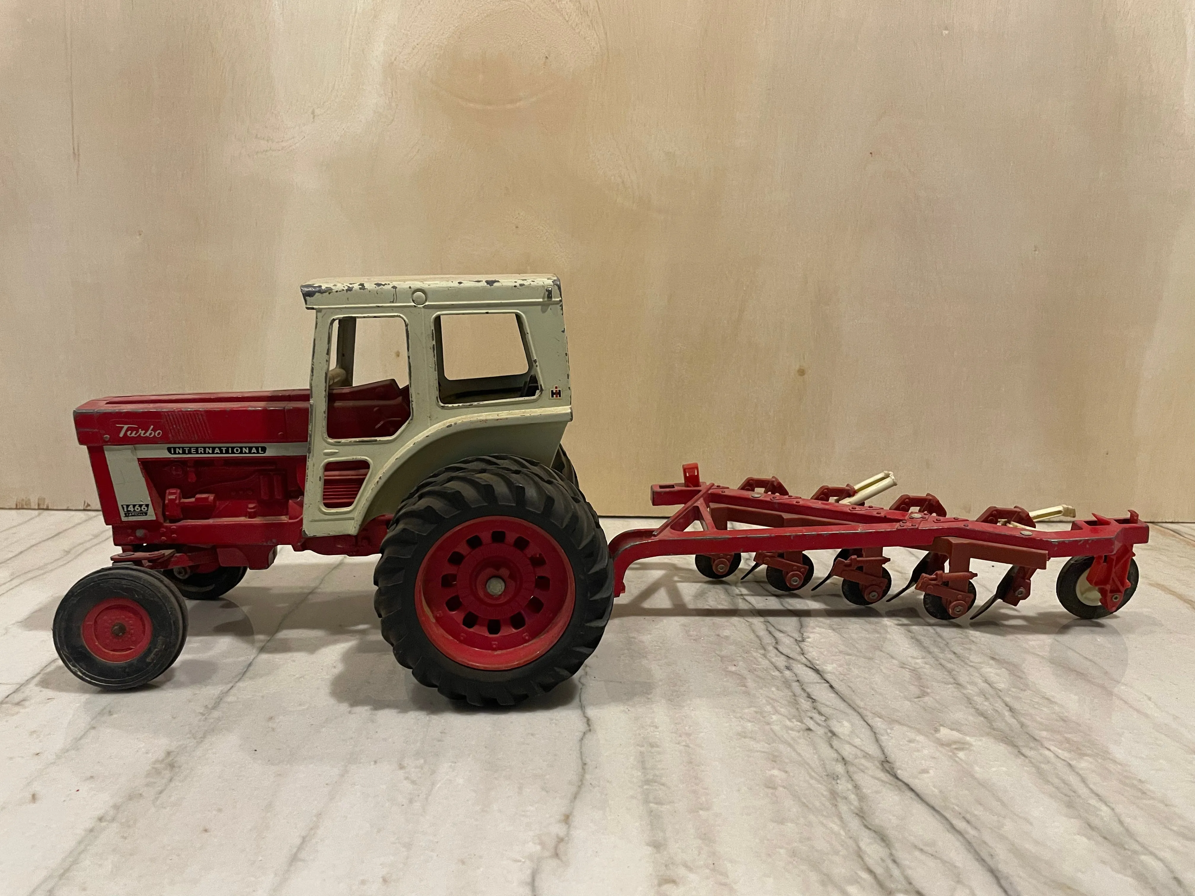 60’s International Turbo 1466 Tractor Toy with Ertl Plow