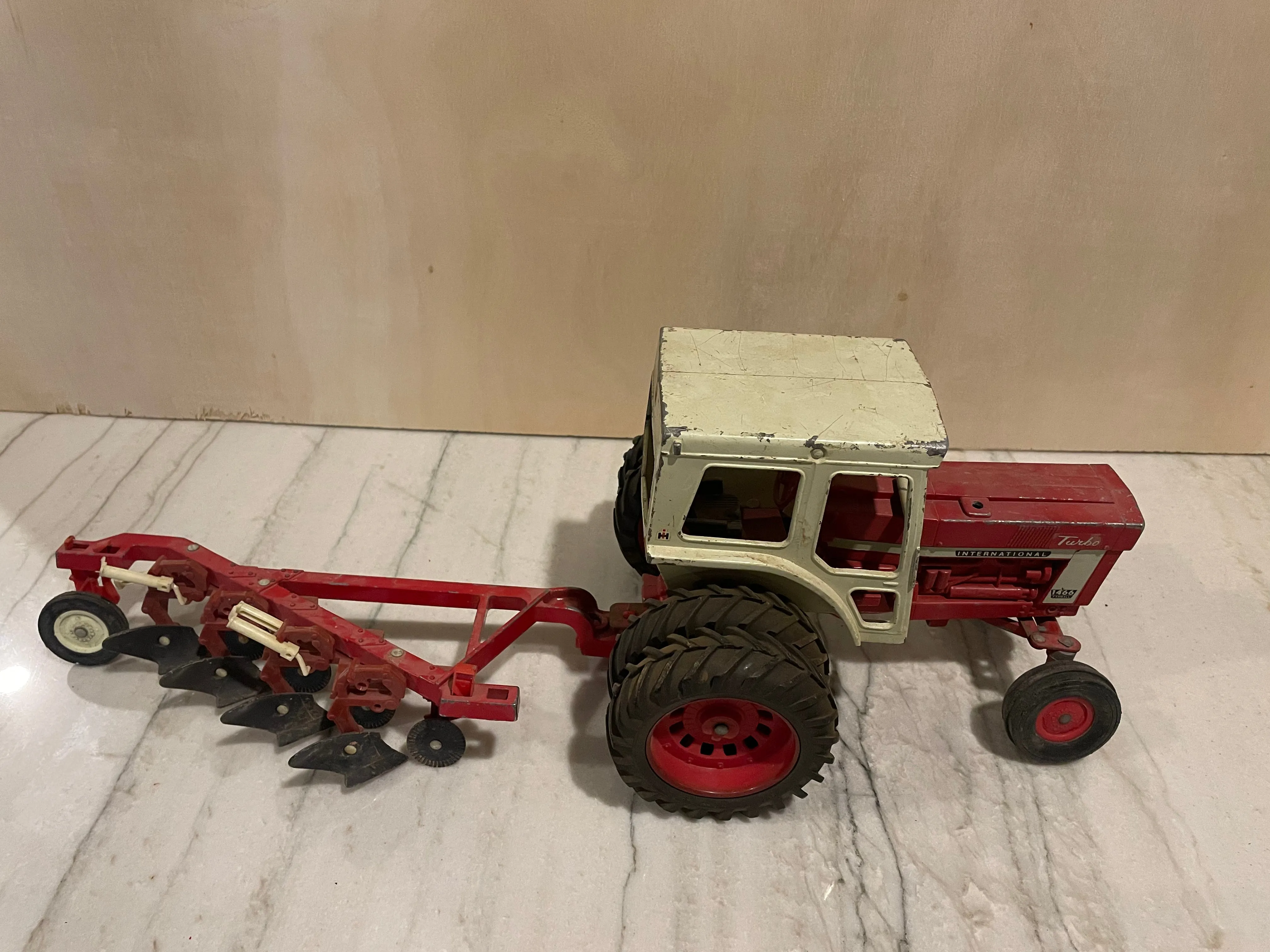 60’s International Turbo 1466 Tractor Toy with Ertl Plow