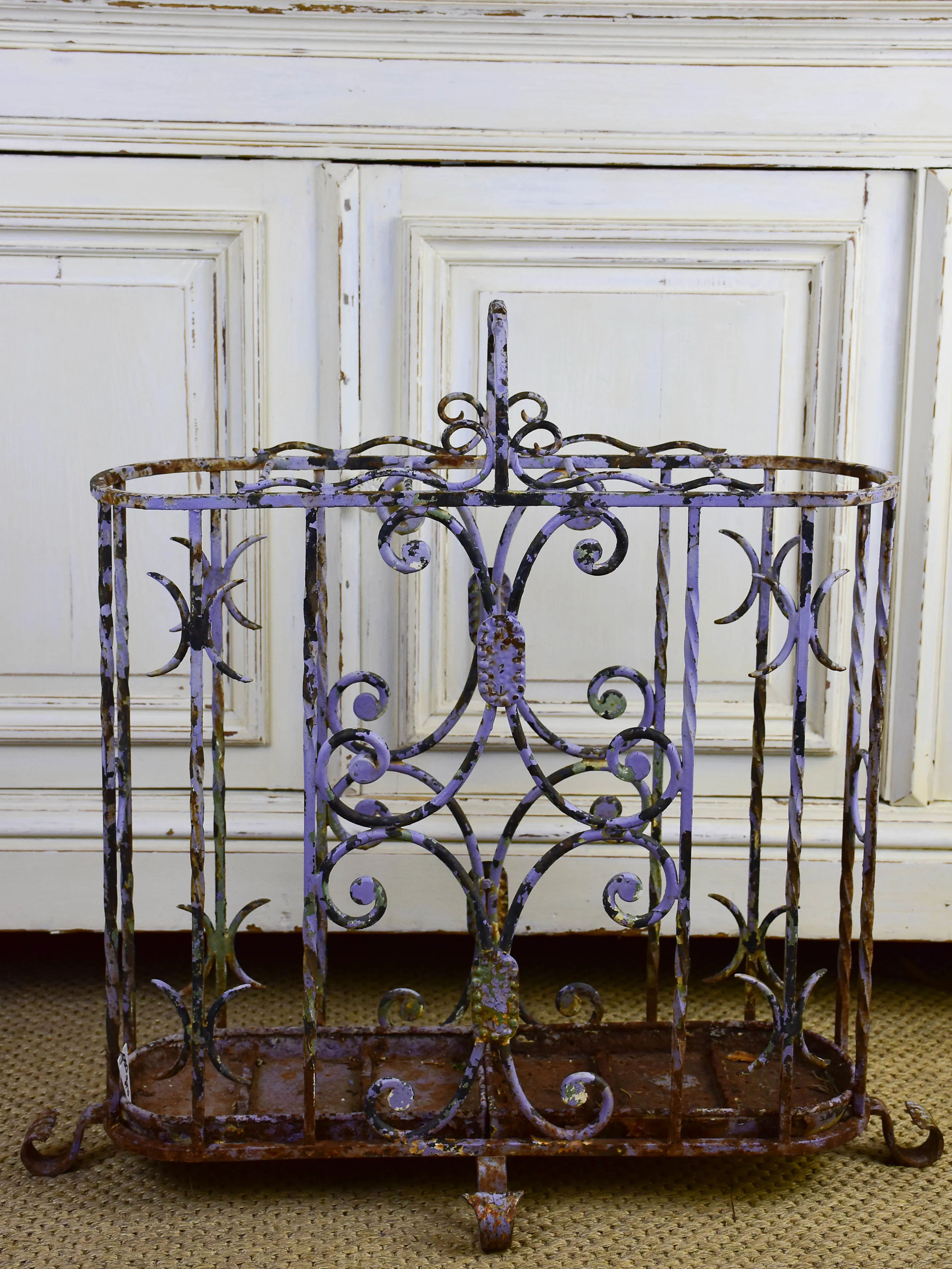 Antique wrought iron umbrella stand