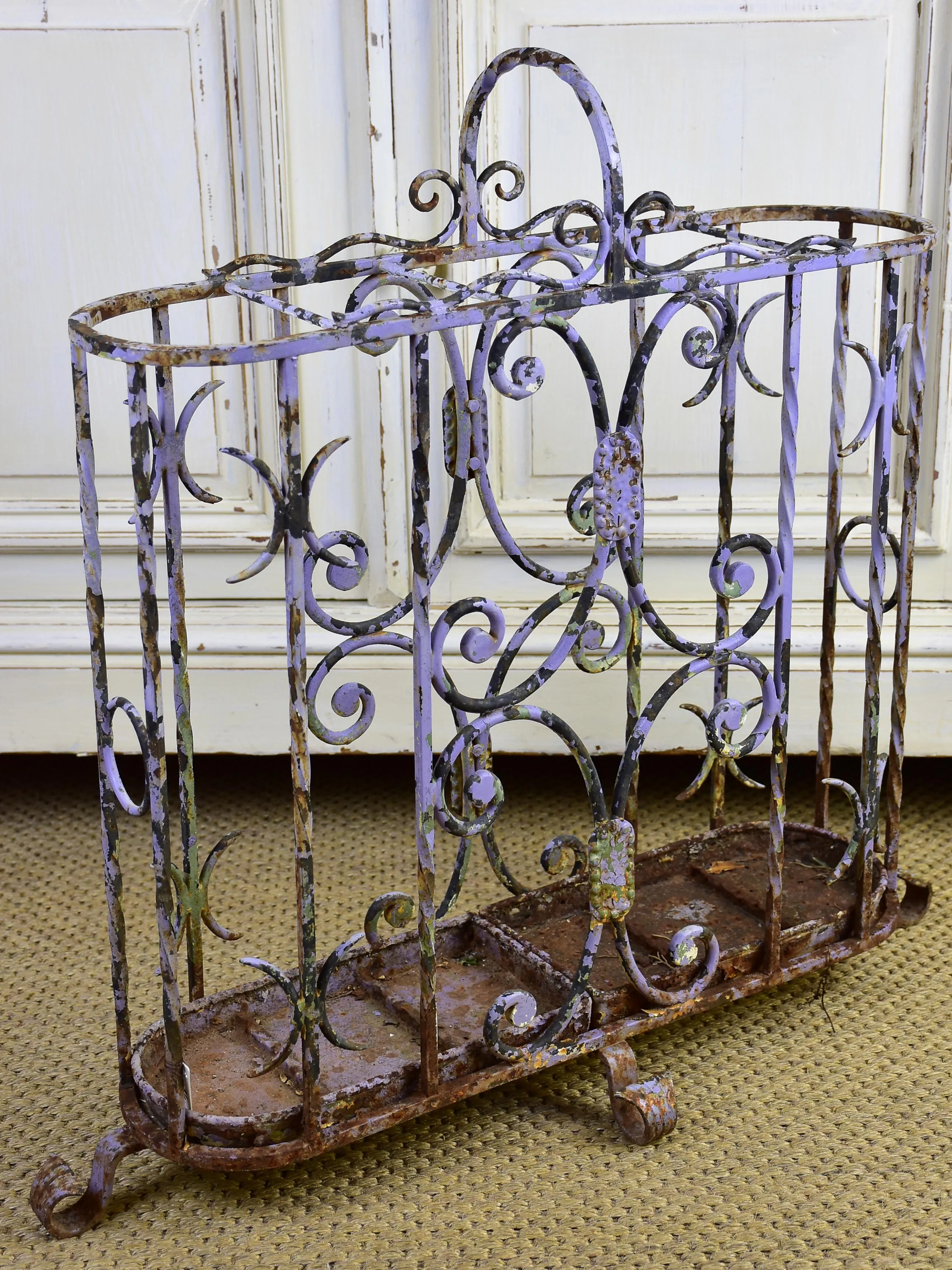 Antique wrought iron umbrella stand