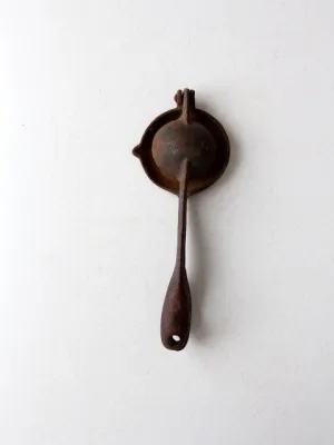 vintage hand-held juice squeezer